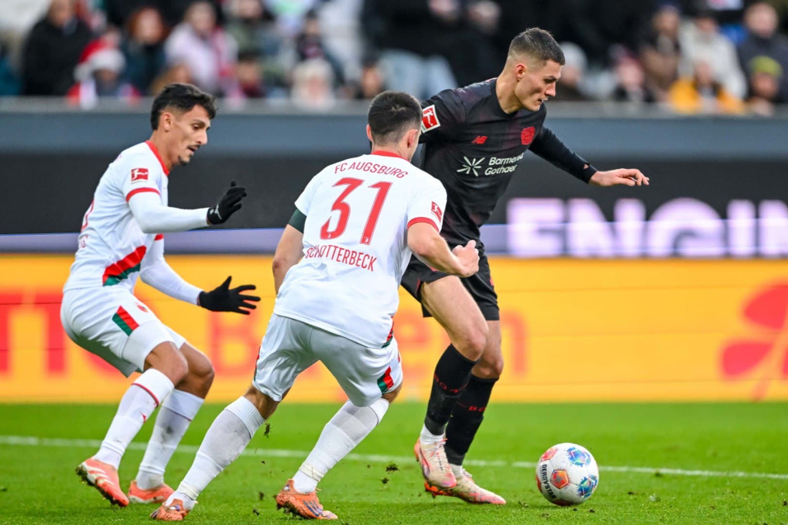 “Leverkusen Falls to Augsburg in Bundesliga Clash”